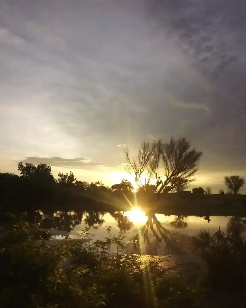 Foto: Amanecer sobre una charca en Wankama · Níger